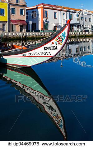Moliceiro boat in a channel, Aveiro, Portugal, Europe View Large Photo Image Stock Photograph - Moliceiro boat in a channel, Aveiro, Portugal, Europe. Fotosearch