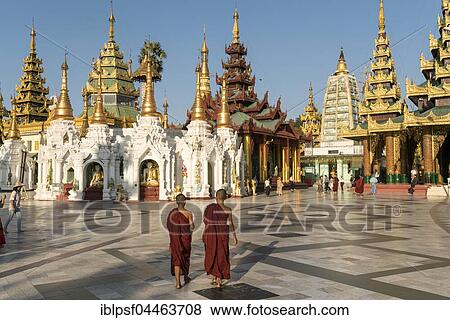 Monks in front of Shwedagon Zedi Daw, Shwedagon Pagoda, Yangon, Myanmar, Asia View Large Photo Image Stock Photo - Monks in front of Shwedagon Zedi Daw, Shwedagon Pagoda, Yangon, Myanmar, Asia. Fotosearch