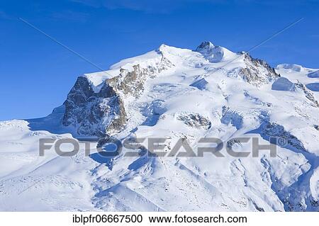 Stock Image - Monte Rosa, 4633 m, Dufourspitze -4634m, Valais, Switzerland, Europe. Fotosearch