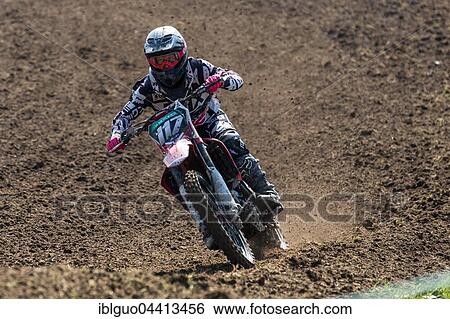Motocross rider, Inter Motocross Swiss Championship Malters, Lucerne, Switzerland, Europe View Large Photo Image Stock Photograph - Motocross rider, Inter Motocross Swiss Championship Malters, Lucerne, Switzerland, Europe. Fotosearch