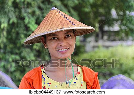 Stock Photo - Native Woman with typical headwear, Mandalay, Myanmar, Asia. Fotosearch