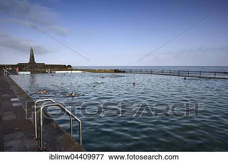 Natural seawater pool with Bajamar Lighthouse, piscinas naturales, Bajamar Lighthouse, Tenerife, Canary Islands, Spain, Europe View Large Photo Image Stock Photo - Natural seawater pool with Bajamar Lighthouse, piscinas naturales, Bajamar Lighthouse, Tenerife, Canary Islands, Spain, Europe. Fotosearch