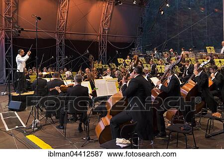 Nuremberg Symphonic Orchestra, open air stage, classic open air at the picnic in the park, Luitpoldhain, Nuremberg, Mittelfranken, Franconia, Bavaria, Germany, Europe View Large Photo Image Stock Photo - Nuremberg Symphonic Orchestra, open air stage, classic open air at the picnic in the park, Luitpoldhain, Nuremberg, Mittelfranken, Franconia, Bavaria, Germany, Europe. Fotosearch