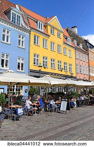 Stock Image - Nyhavn, waterfront and entertainment district, Copenhagen, Denmark, Europe. Fotosearch