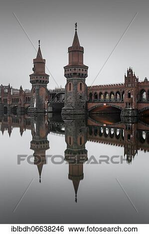 Oberbaum bridge across the Spree, connecting the Berlin districts of Kreuzberg and Friedrichshain, Berlin, Germany, Europe View Large Photo Image Stock Photograph - Oberbaum bridge across the Spree, connecting the Berlin districts of Kreuzberg and Friedrichshain, Berlin, Germany, Europe. Fotosearch