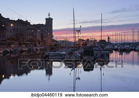 Old city with boats in the harbour at sunrise, La Ciotat, Provence-Alpes-Côte d'Azur, France, Europe View Large Photo Image Stock Photo - Old city with boats in the harbour at sunrise, La Ciotat, Provence-Alpes-Côte d'Azur, France, Europe. Fotosearch