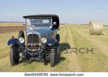 Oldtimer Citroen B10 in hay field, Torpedo Commerciale, made in 1925. 4-cylinder inline engine, engine capacity 1470 cc, 20 PS, all-steel body View Large Photo Image Stock Image - Oldtimer Citroen B10 in hay field, Torpedo Commerciale, made in 1925. 4-cylinder inline engine, engine capacity 1470 cc, 20 PS, all-steel body. Fotosearch