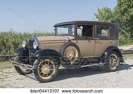 Oldtimer Ford A, built in 1930, 4 cylinders, displacement 3500 cc, weight 1275 kg, 2x3 forward gears, 40 hp, 95 km / h View Large Photo Image Stock Photo - Oldtimer Ford A, built in 1930, 4 cylinders, displacement 3500 cc, weight 1275 kg, 2x3 forward gears, 40 hp, 95 km / h. Fotosearch