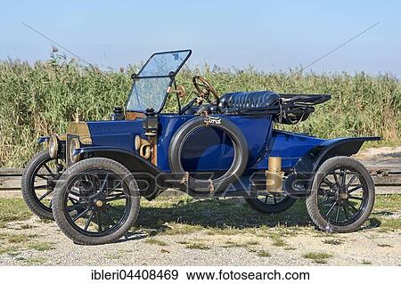 Stock Photo - Oldtimer Ford T Runabout built in 1913, 4 cylinders, displacement 2700 cc, 2 forward gears, semi-automatic, 20 hp, 72 km / h. Fotosearch