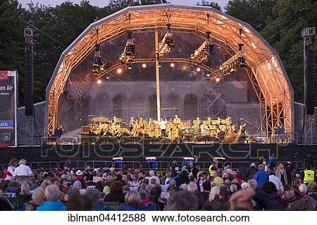 Open-air stage, classic open air at the picnic in the park with Nuremberg Symphonic Orchestra, Luitpoldhain, Nuremberg, Mittelfranken, Franconia, Bavaria, Germany, Europe View Large Photo Image Stock Photo - Open-air stage, classic open air at the picnic in the park with Nuremberg Symphonic Orchestra, Luitpoldhain, Nuremberg, Mittelfranken, Franconia, Bavaria, Germany, Europe. Fotosearch