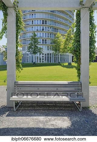 Park bench at the foot of high-rise residential building, Dübendorf, Switzerland, Europe View Large Photo Image Stock Image - Park bench at the foot of high-rise residential building, Dübendorf, Switzerland, Europe. Fotosearch