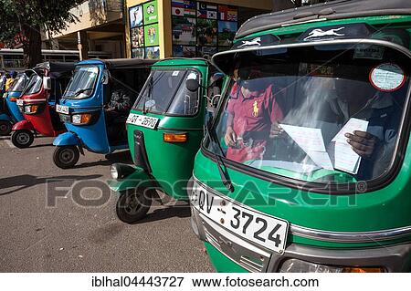 Passenger transportation, tuk-tuks waiting for passengers, Nuwara Eliya, Central Province, Sri Lanka, Asia View Large Photo Image Stock Photo - Passenger transportation, tuk-tuks waiting for passengers, Nuwara Eliya, Central Province, Sri Lanka, Asia. Fotosearch
