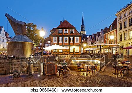 Pedestrian zone water west at the Hanseatic harbour with view of the Holztretkrahn in the evening, Old Town, Stade, Lower Saxony, Germany, Europe View Large Photo Image Stock Image - Pedestrian zone water west at the Hanseatic harbour with view of the Holztretkrahn in the evening, Old Town, Stade, Lower Saxony, Germany, Europe. Fotosearch