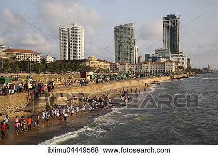 People on small sandy beach at Galle Face Green, Colombo, Sri Lanka, Asia View Large Photo Image Stock Photo - People on small sandy beach at Galle Face Green, Colombo, Sri Lanka, Asia. Fotosearch