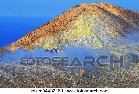 People walking through fumaroles on Gran Crater rim, Vulcano Island, Aeolian Islands, Italy, Europe View Large Photo Image Stock Image - People walking through fumaroles on Gran Crater rim, Vulcano Island, Aeolian Islands, Italy, Europe. Fotosearch