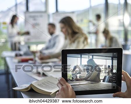 Photo with an iPad, Creative teamwork, presentation, brainstorming, project work, workshop, training, seminar for executives, adult education, Austria, Europe View Large Photo Image Stock Photo - Photo with an iPad, Creative teamwork, presentation, brainstorming, project work, workshop, training, seminar for executives, adult education, Austria, Europe. Fotosearch