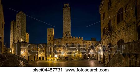Stock Image - Piazza del Duomo at night, San Gimignano, Tuscany, Italy, Europe. Fotosearch
