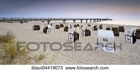 Pier and chairs on beach, morning light, Bansin, Usedom, Mecklenburg-Western Pomerania, Germany, Europe View Large Photo Image Stock Image - Pier and chairs on beach, morning light, Bansin, Usedom, Mecklenburg-Western Pomerania, Germany, Europe. Fotosearch