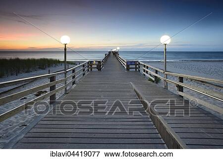 Pier on beach, sunset, Rerik, Mecklenburg-Western Pomerania, Germany, Europe View Large Photo Image Stock Photo - Pier on beach, sunset, Rerik, Mecklenburg-Western Pomerania, Germany, Europe. Fotosearch
