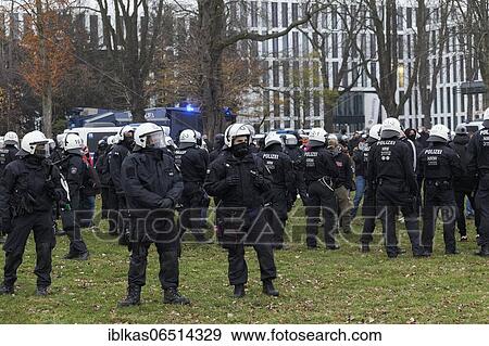 Stock Photo - Police intervention at the demonstration against Corona measures on Dec. 6, 2020, organized by the alliance Querdenken, Düsseldorf, North Rhine-Westphalia, Germany, Europe. Fotosearch