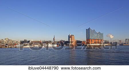 Port of Hamburg, northern bank of the Elbe River with Elbphilharmonie, Elbe Philharmonic Hall, Hanseatic Trade Center and office buildings, Kehrwiederspitze, HafenCity, Hamburg, Germany, Europe View Large Photo Image Stock Image - Port of Hamburg, northern bank of the Elbe River with Elbphilharmonie, Elbe Philharmonic Hall, Hanseatic Trade Center and office buildings, Kehrwiederspitze, HafenCity, Hamburg, Germany, Europe. Fotosearch
