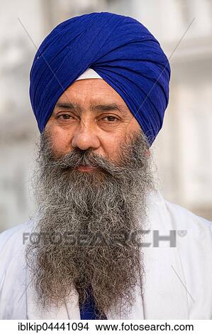 Portrait, Devout Sikh with a blue turban at Amrit Sagar, Golden Temple, Amritsar, Punjab, India, Asia View Large Photo Image Picture - Portrait, Devout Sikh with a blue turban at Amrit Sagar, Golden Temple, Amritsar, Punjab, India, Asia. Fotosearch