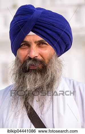 Portrait, Devout Sikh with a blue turban at Amrit Sagar, Golden Temple, Amritsar, Punjab, India, Asia View Large Photo Image Stock Photograph - Portrait, Devout Sikh with a blue turban at Amrit Sagar, Golden Temple, Amritsar, Punjab, India, Asia. Fotosearch