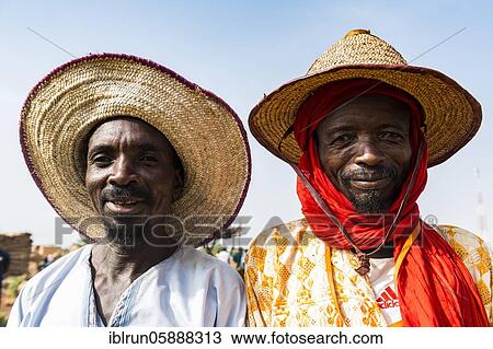 Portrait of two friendly Peul men, Niger, Africa View Large Photo Image Stock Image - Portrait of two friendly Peul men, Niger, Africa. Fotosearch