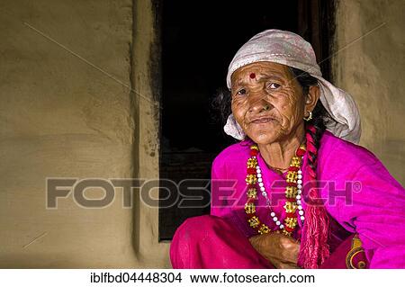 Portrait, old, wrinkled native woman, wearing pink shirt, Ghandruk, Kaski District, Nepal, Asia View Large Photo Image Picture - Portrait, old, wrinkled native woman, wearing pink shirt, Ghandruk, Kaski District, Nepal, Asia. Fotosearch