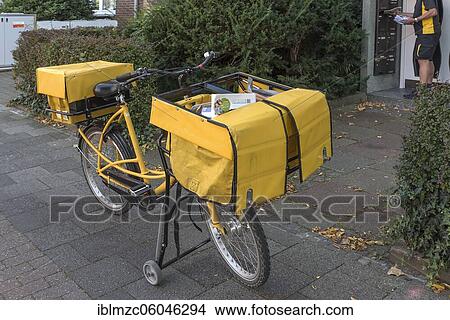 Postal bike of a postman, Münster, North Rhine-Westphalia, Germany, Europe View Large Photo Image Picture - Postal bike of a postman, Münster, North Rhine-Westphalia, Germany, Europe. Fotosearch