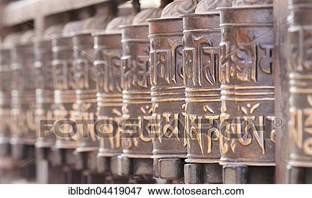 Prayer wheels at Swayambhunath temple, Kathmandu Nepal View Large Photo Image Stock Photo - Prayer wheels at Swayambhunath temple, Kathmandu Nepal. Fotosearch