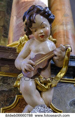 Putto, Cherub, Angel with lute, St. Kilian, Bad Heilbrunn, Upper Bavaria, Bavaria, Germany, Europe View Large Photo Image Stock Photo - Putto, Cherub, Angel with lute, St. Kilian, Bad Heilbrunn, Upper Bavaria, Bavaria, Germany, Europe. Fotosearch