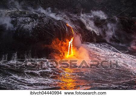 Pu'u'Ō'ō volcano, eruption, glowing hot lava flowing into the Pacific Ocean, Hawai'i Volcanoes National Park, Big Island, Hawaii, USA, North America View Large Photo Image Picture - Pu'u'Ō'ō volcano, eruption, glowing hot lava flowing into the Pacific Ocean, Hawai'i Volcanoes National Park, Big Island, Hawaii, USA, North America. Fotosearch