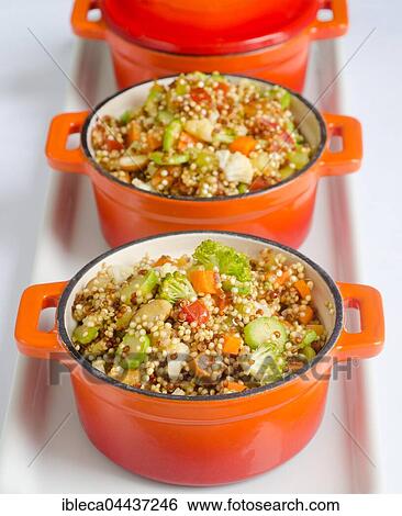 Quinoa couscous with vegetables in a small pot View Large Photo Image Stock Photograph - Quinoa couscous with vegetables in a small pot. Fotosearch
