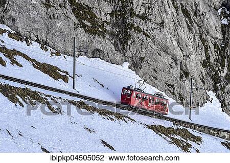 Rack railway going up Mount Pilatus in winter, steepest rack railway in the world, Pilatus, Kriens, Switzerland, Europe View Large Photo Image Stock Image - Rack railway going up Mount Pilatus in winter, steepest rack railway in the world, Pilatus, Kriens, Switzerland, Europe. Fotosearch
