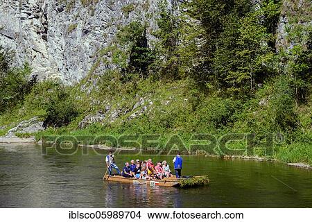 Rafting with tourists at Cerveny Klastor, Dunajez, Pieniny National Park, Slovakia, Europe View Large Photo Image Picture - Rafting with tourists at Cerveny Klastor, Dunajez, Pieniny National Park, Slovakia, Europe. Fotosearch