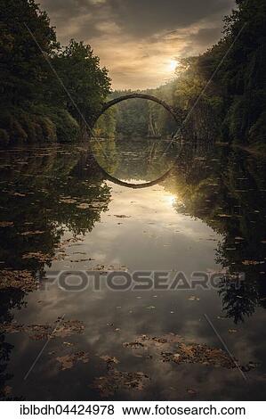 Rakotzbrücke, Teufelsbrücke, bridge in Kromlauer Park, Kromlau, Saxony, Germany, Europe View Large Photo Image Stock Photo - Rakotzbrücke, Teufelsbrücke, bridge in Kromlauer Park, Kromlau, Saxony, Germany, Europe. Fotosearch
