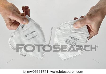 Stock Image - Real (right) and fake (left) FFP2 mask, Corona crisis, Stuttgart, Baden-Württemberg, Germany, Europe. Fotosearch