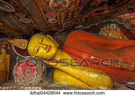 Reclining Buddha statue and painted ceilings, Aluvihara Rock Cave Temple, Central Province, Sri Lanka, Asia View Large Photo Image Picture - Reclining Buddha statue and painted ceilings, Aluvihara Rock Cave Temple, Central Province, Sri Lanka, Asia. Fotosearch