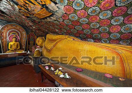 Reclining Buddha statue, painted ceilings, statues, Aluvihara Rock Cave Temple, Central Province, Sri Lanka, Asia View Large Photo Image Stock Image - Reclining Buddha statue, painted ceilings, statues, Aluvihara Rock Cave Temple, Central Province, Sri Lanka, Asia. Fotosearch