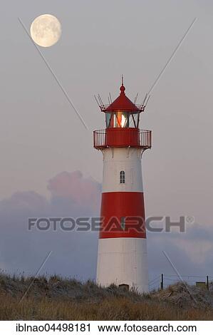 Red and white striped lighthouse List East at full moon, twilight Ellenbogen, List, Sylt, North Frisia, Schleswig-Holstein, Germany, Europe View Large Photo Image Stock Image - Red and white striped lighthouse List East at full moon, twilight Ellenbogen, List, Sylt, North Frisia, Schleswig-Holstein, Germany, Europe. Fotosearch