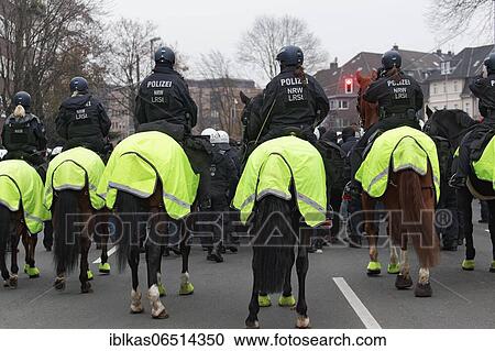 Rider squad of the police at the demonstration against Corona measures on Dec. 6, 2020, organized by the alliance Querdenken, Düsseldorf, North Rhine-Westphalia, Germany, Europe View Large Photo Image Stock Image - Rider squad of the police at the demonstration against Corona measures on Dec. 6, 2020, organized by the alliance Querdenken, Düsseldorf, North Rhine-Westphalia, Germany, Europe. Fotosearch
