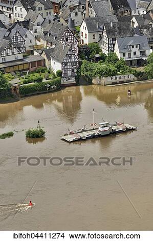 River Moselle, flooded, ferry dock, Pünderich, Rhineland-Palatinate, Germany, Europe View Large Photo Image Picture - River Moselle, flooded, ferry dock, Pünderich, Rhineland-Palatinate, Germany, Europe. Fotosearch