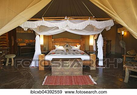 Safari luxury tent, Interior, Severin Safari Camp, Tsavo West National Park, Taita-Taveta County, Kenya, Africa View Large Photo Image Stock Photo - Safari luxury tent, Interior, Severin Safari Camp, Tsavo West National Park, Taita-Taveta County, Kenya, Africa. Fotosearch