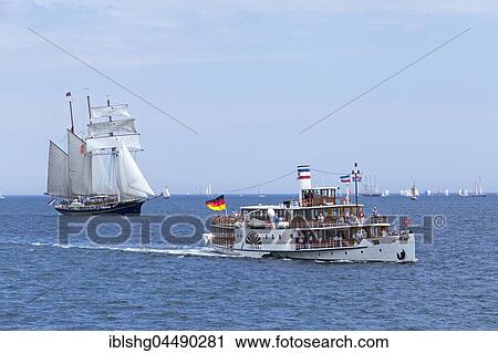 Sailboat Gulden Leeuw, paddle steamer Freya, Kieler Woche, Kiel fjords, Kiel, Schleswig-Holstein, Germany, Europe View Large Photo Image Stock Image - Sailboat Gulden Leeuw, paddle steamer Freya, Kieler Woche, Kiel fjords, Kiel, Schleswig-Holstein, Germany, Europe. Fotosearch