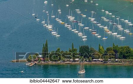 Sailboats in marina, Bardolino, Lake Garda, Veneto, Italy, Europe View Large Photo Image Stock Photo - Sailboats in marina, Bardolino, Lake Garda, Veneto, Italy, Europe. Fotosearch
