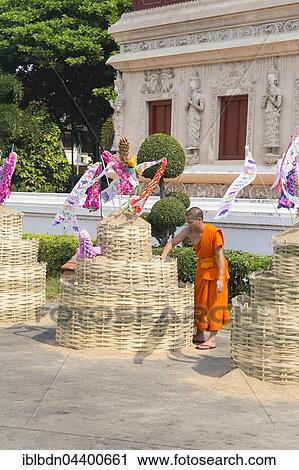 Stock Image - Sand chedis at temple during Songkran festival, Thai New Year's festival, Wat Phra Singh, Chiang Mai, Thailand, Asia. Fotosearch