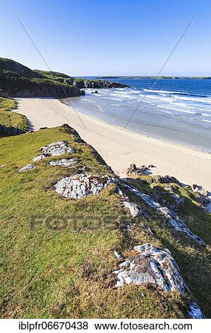 Sandy beach beach at the north coast Scotland, Great Britain View Large Photo Image Stock Photo - Sandy beach beach at the north coast Scotland, Great Britain. Fotosearch