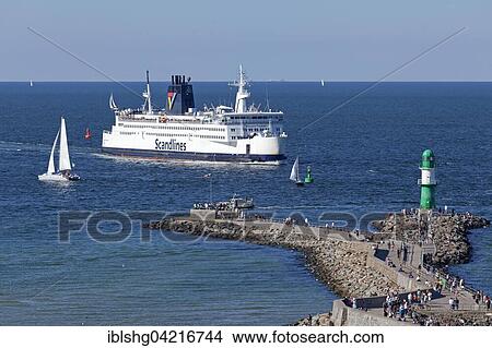 Scandlines ferry, Warnemünde Port, harbor entrance, Mecklenburg-Western Pomerania, Germany, Europe View Large Photo Image Picture - Scandlines ferry, Warnemünde Port, harbor entrance, Mecklenburg-Western Pomerania, Germany, Europe. Fotosearch