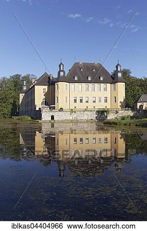 Schloss Dyck Castle with water reflection in moat, Jüchen, Niederrhein, North Rhine-Westphalia, Germany, Europe View Large Photo Image Stock Photograph - Schloss Dyck Castle with water reflection in moat, Jüchen, Niederrhein, North Rhine-Westphalia, Germany, Europe. Fotosearch